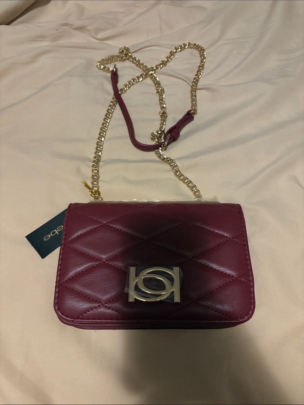 bebe Abigail logo top Crossbody Bag in Wine with Gold Hardware